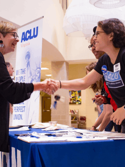 ACLUVA Office Assistant Zhue shook hand with guests at our annual meeting