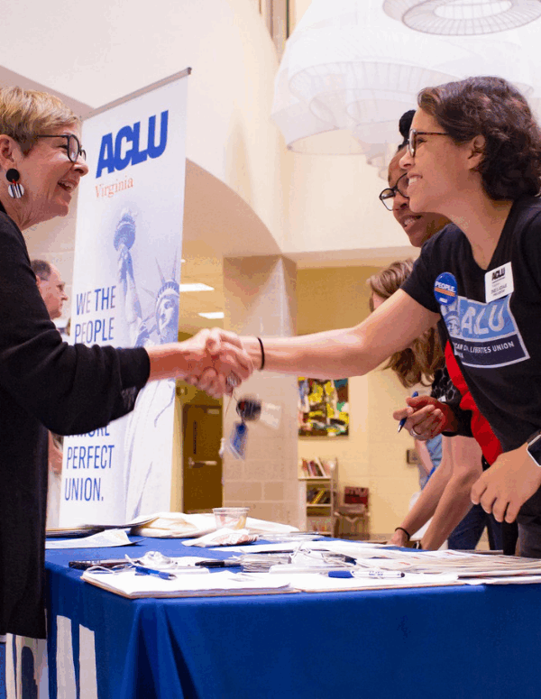 ACLUVA Office Assistant Zhue shook hand with guests at our annual meeting