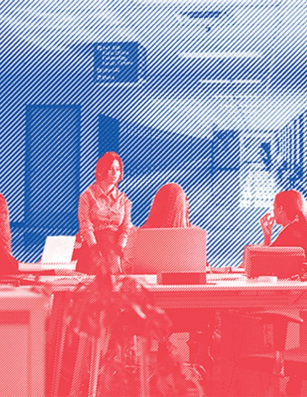 stock photo of an office with people sitting at their desks