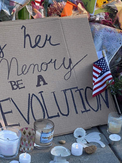 a sign left outside the Supreme Court to remember Justice Ruth Bader Ginsburg.