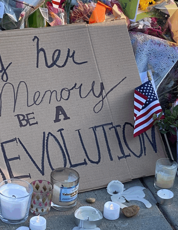a sign left outside the Supreme Court to remember Justice Ruth Bader Ginsburg.