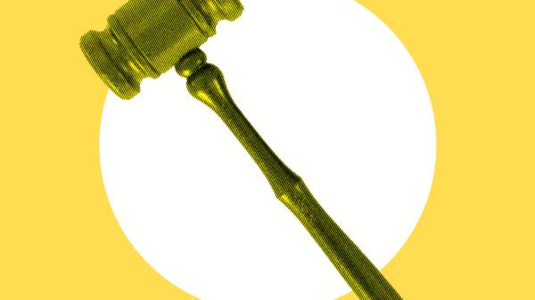 Yellow background with a white circle in the center. A yellow gavel is on top.