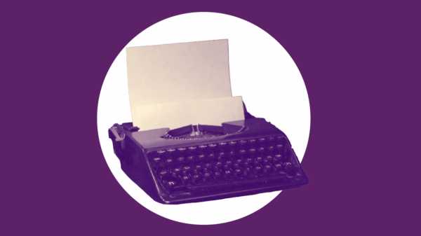 A purple typewriter over a white circle and purple background to signify First Amendment rights press