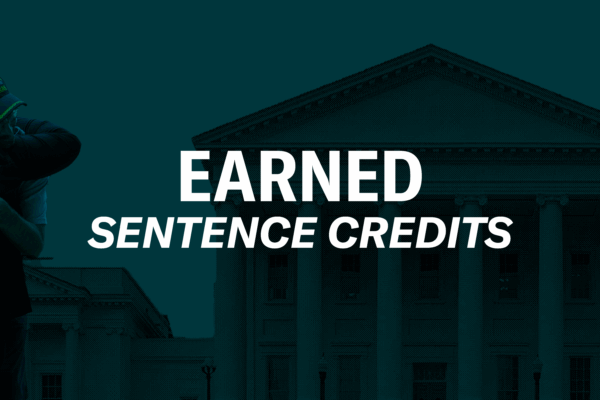 Over a a dark green background of the Virginia state capitol is a person embracing a recently returned Virginian in a hug. To the right of the graphics is a black gavel. In the middle of the graphic is text, "Earned sentence credits."