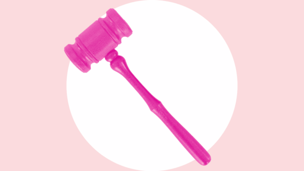 A neon pink gavel over a white circle, with a light pink background.