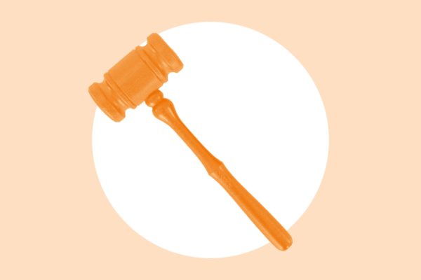 An orange gavel over a white circle, with a light orange background.