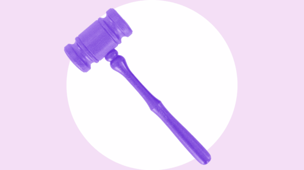 Over a light purple background is a bright purple gavel.