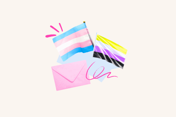 An envelope lays over a cream background with pink doodles with the trans pride flag and nonbinary pride flag.