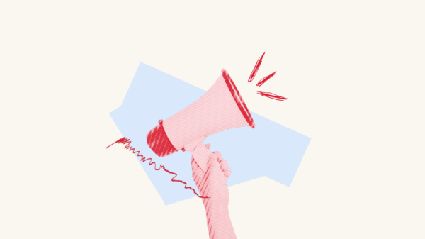 Photo of a hand holding up a megaphone