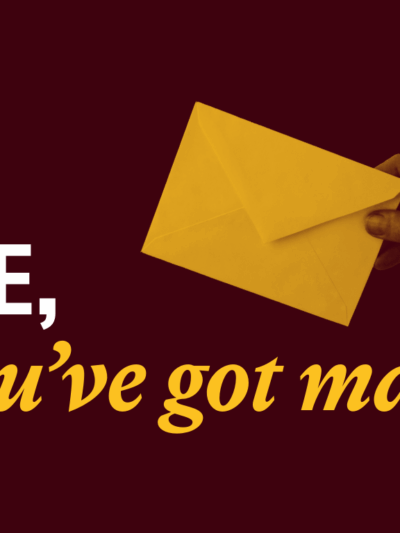 Gold envelope handed from right side over text