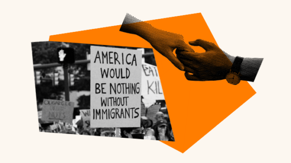 A person holds up a protest sign that says "America would be nothing without immigrants." To the right is a person holding another persons hand.