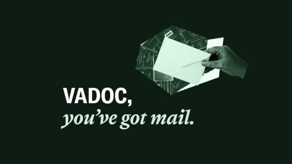 a hand holding out an envelope along with the text "VADOC, you've got mail."