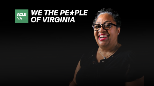 A Black woman is seen smiling towards a camera. She is seen wearing glasses and having short curly hair. She wears a black shirt and pink lipstick. To the left of her is ACLU of Virginia's logo and the text, "We the people of Virginia."