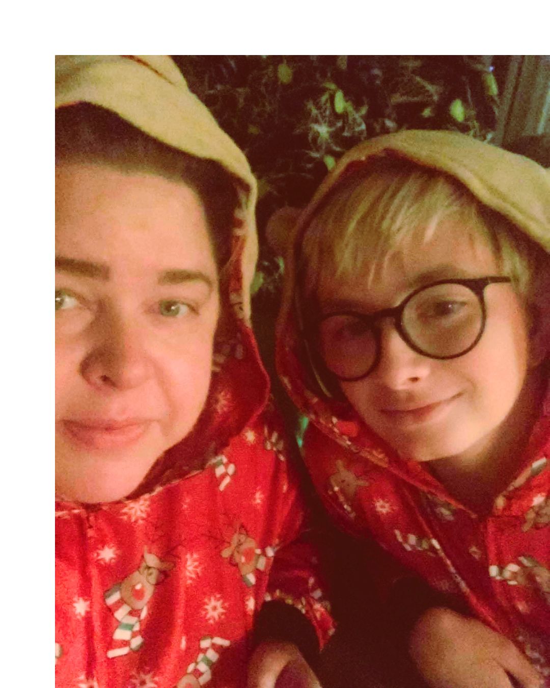 Heather and Izzy wearing matching Christmas pyjamas