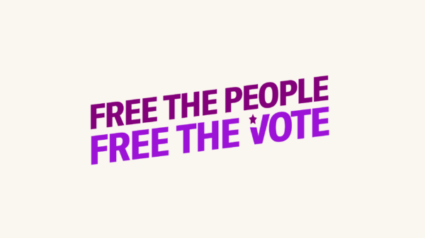 Over a cream background is purple text that says " Free the people. Free the vote."