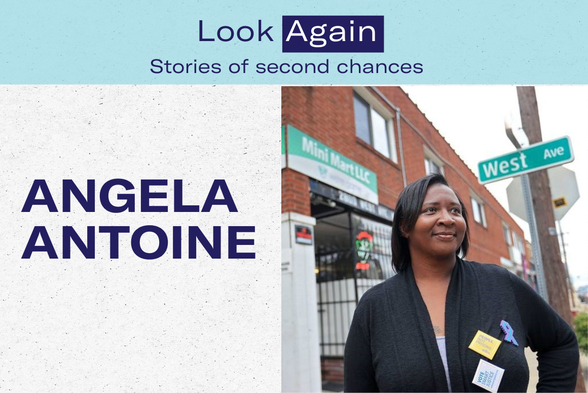 Photo of a Black woman with shoulder-length straight hair standing at West Avanue (in Norfolk) with a Mini Mart behind her.