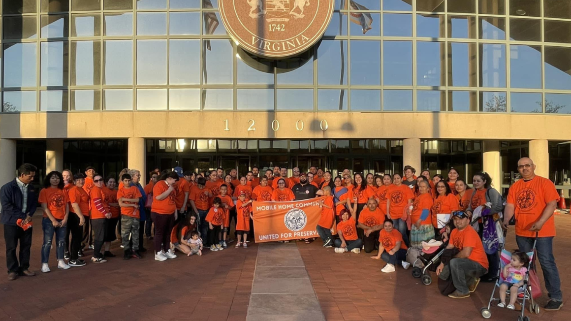 Nearly 100 tenants & workers members wore their branded orange t-shirt and stoof in front of the County of Fairfax building