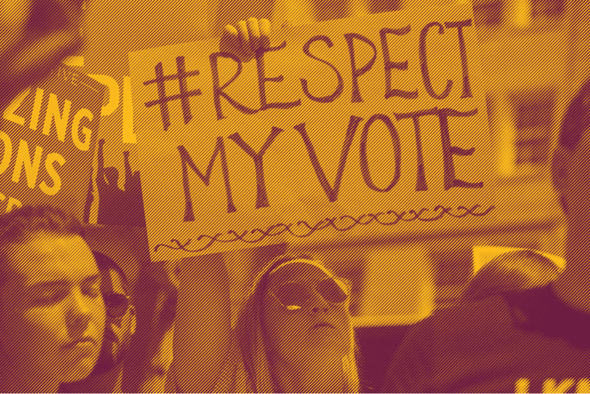 A white woman holding a sign that says "hashtag Respect My Vote"