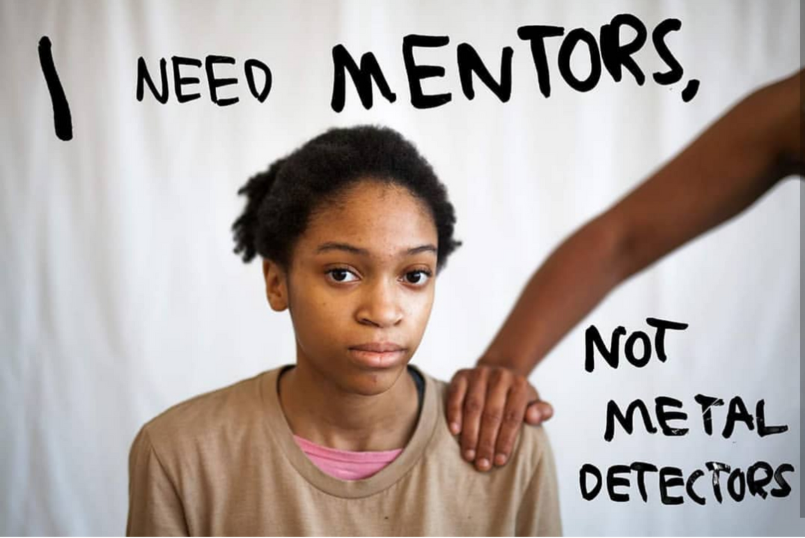 A profile picture of Stephanie Younger, with the word 'I need Mentors, not metal detector' on the white space
