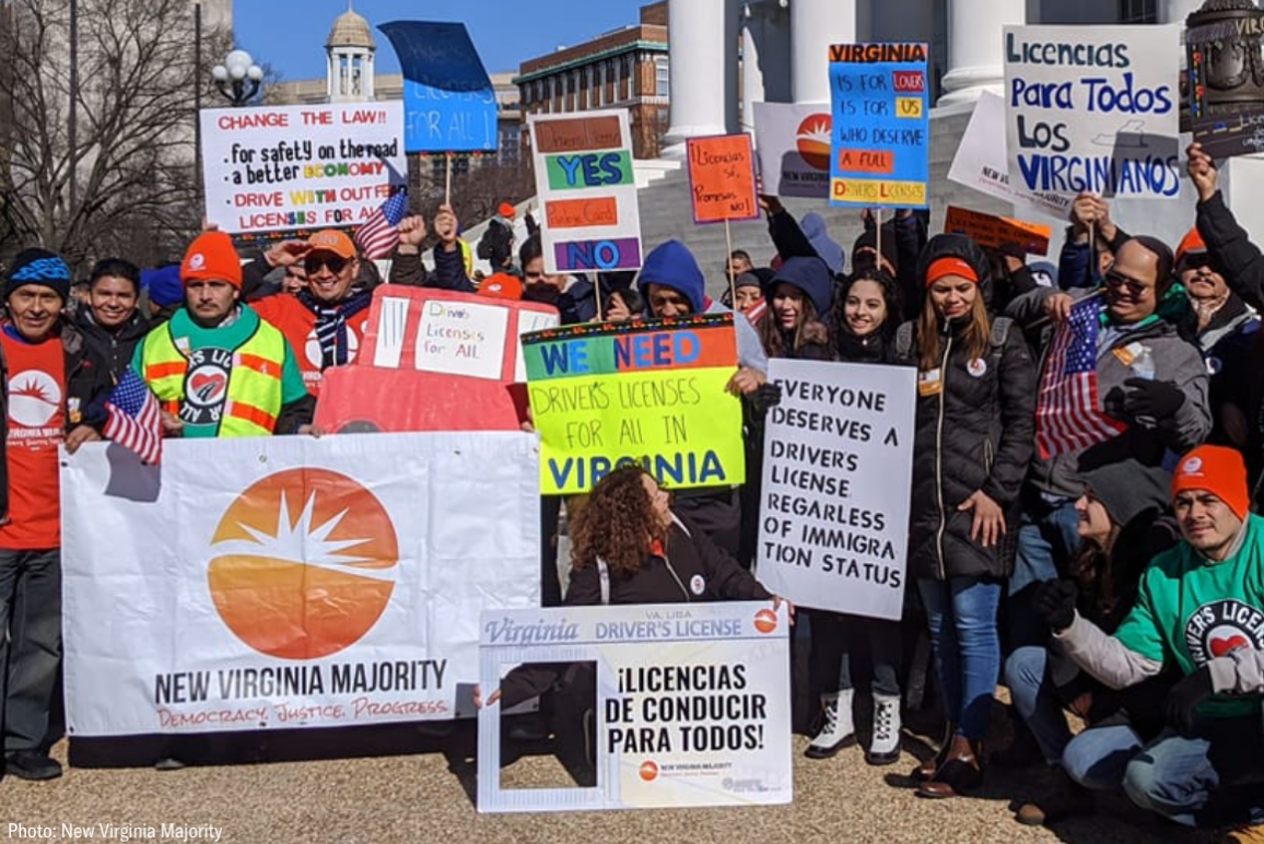 a group of advocates gathered at the Capitol with signs calling for Virginia Driver's Licenses for All