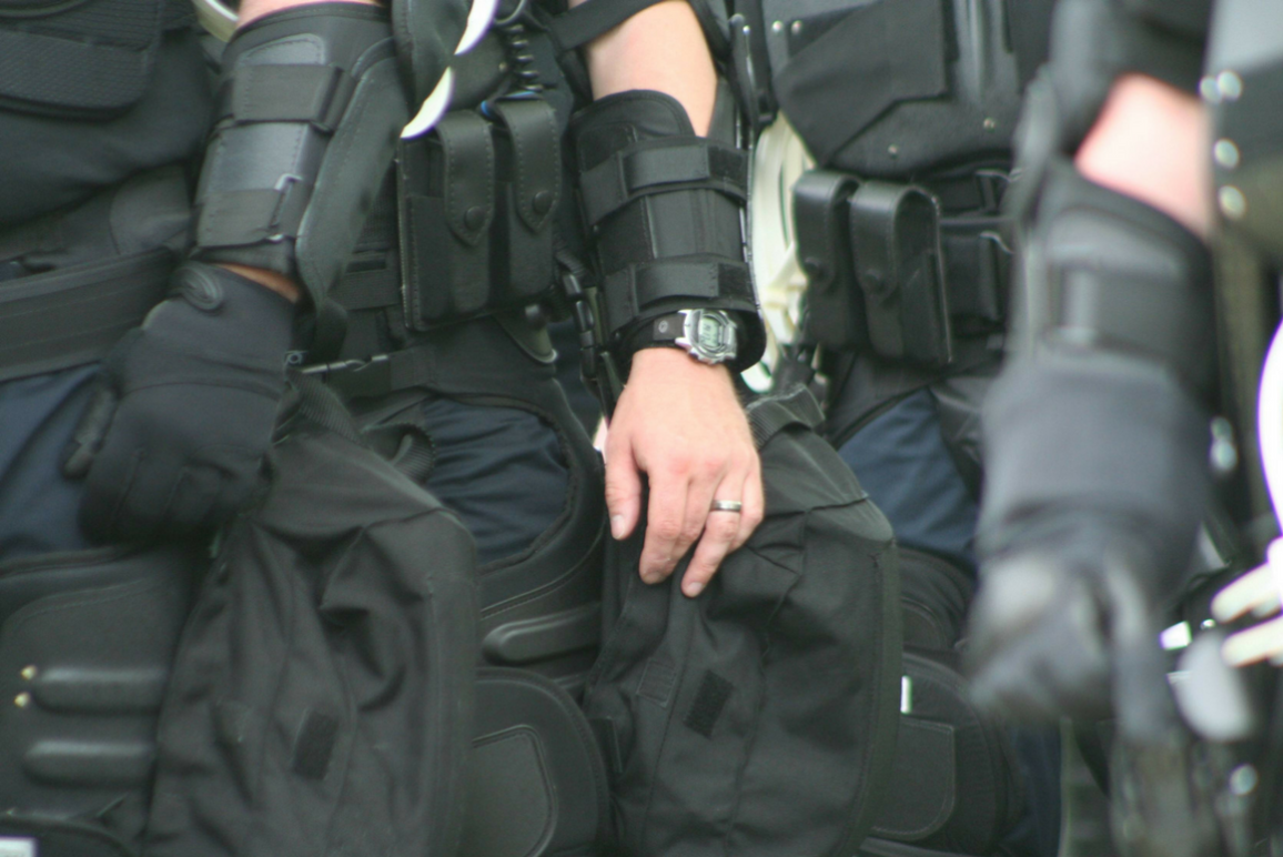 close-up picture of police in military gears
