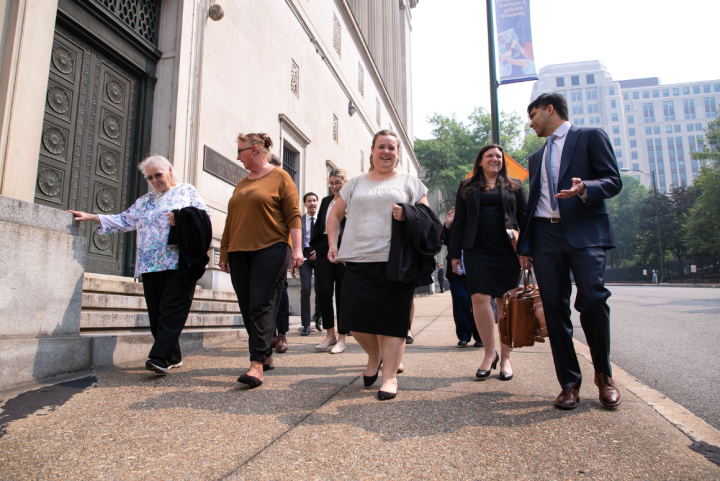 Photo of ACLU-VA's legal team and our plaintiff's family walking out from the Supreme Court of Virginia