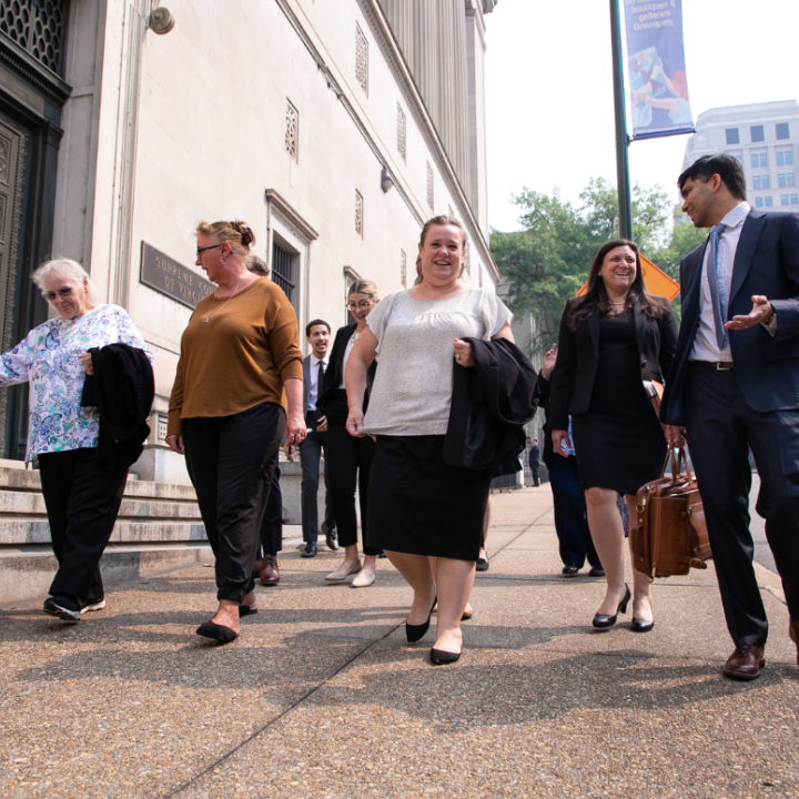 Photo of ACLU-VA's legal team and our plaintiff's family walking out from the Supreme Court of Virginia