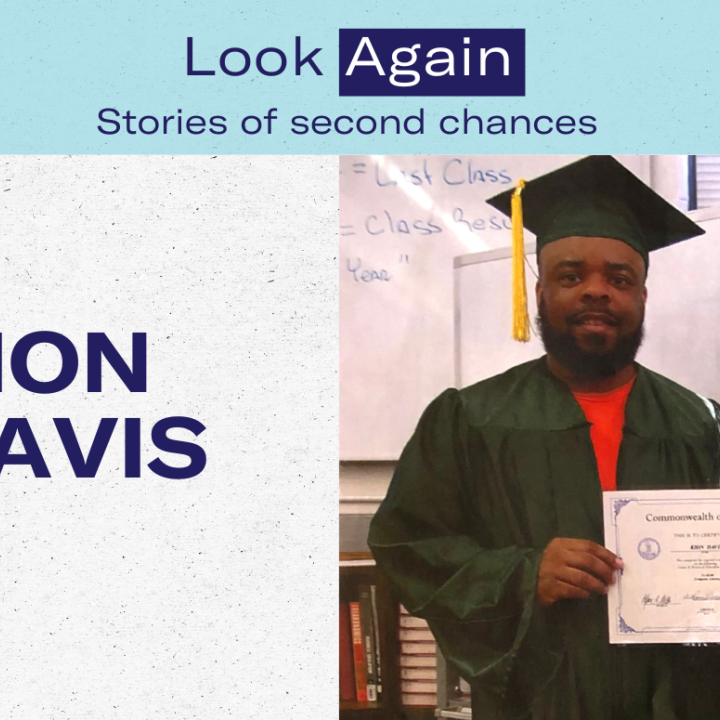 photo of Kion Davis wearing a graduation gown and hat holding his certificate